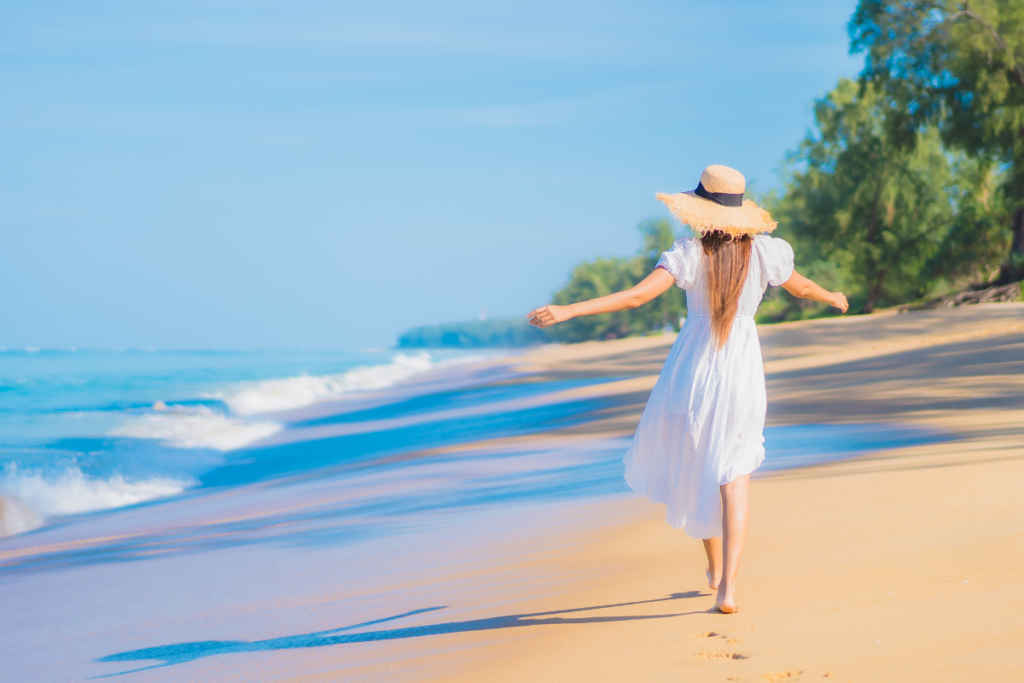 Woman walking on beach