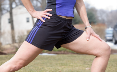 Man performing a Standing Hip Flexor Stretch