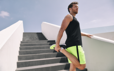 Man performing the Standing Quadricep Stretch