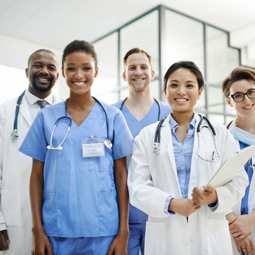 Doctors and Nurses standing in a group picture to help you manage your arthritis pain